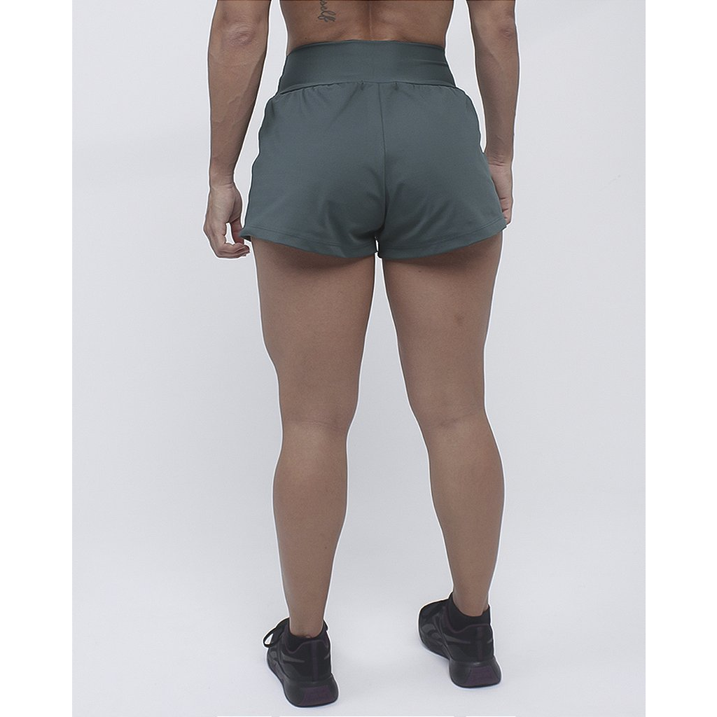 Short fem. Flow Short Interm - Verde Escuro