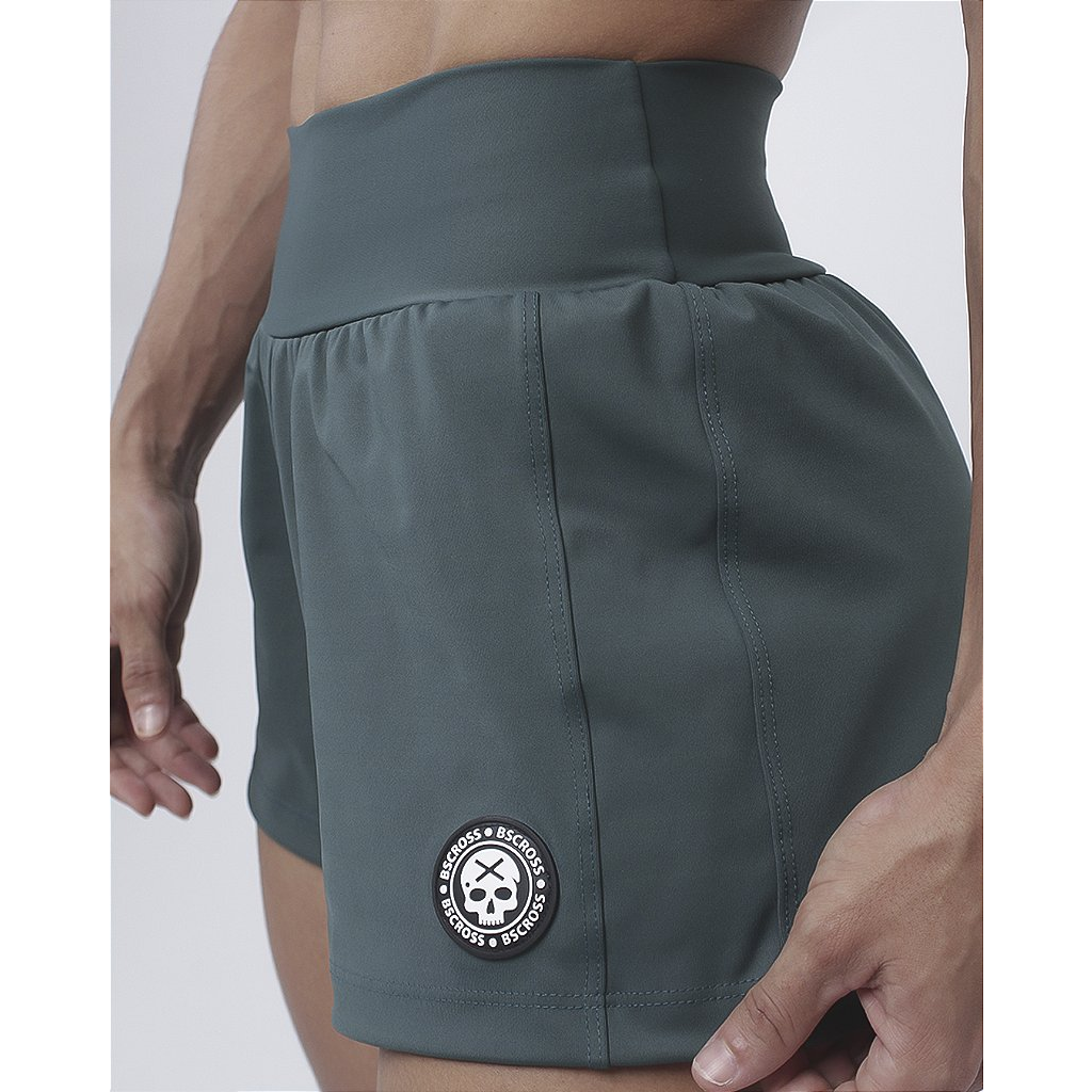 Short fem. Flow Short Interm - Verde Escuro